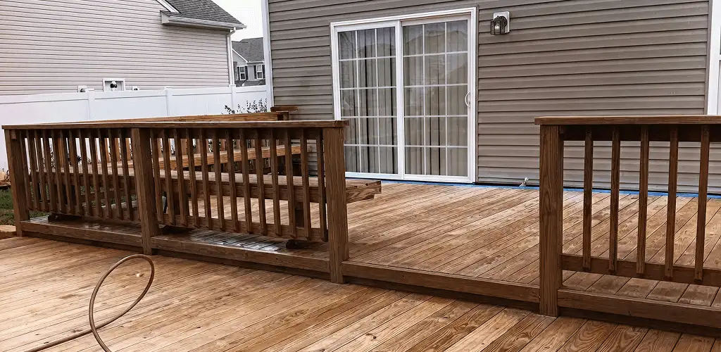 Deck sealing service protecting a backyard wood deck and railings in San Jose, CA