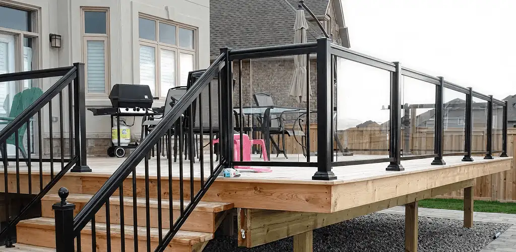 Handrail installation on a deck staircase for safety and code compliance in San Jose, CA